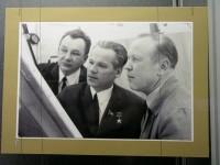 
Museum of Kalashnikov. Pic.5-27 Kalashnikov with two virtuoso tool-makers of his design bureau: P.N.Bukharin (left) and E.V.Bogdanov (right). Both have been awarded with The Order of Lenin. 

 