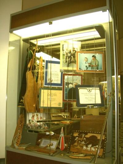 

Museum of Kalashnikov. Pic.7-34 Other side of the showcase with Stoner photo

